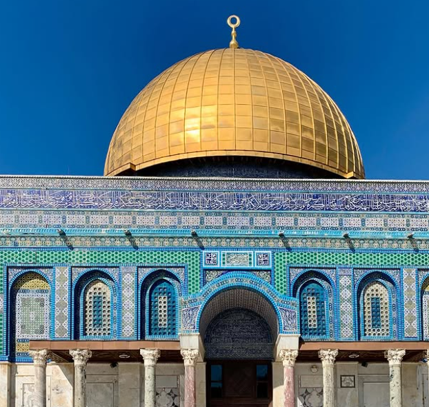 Dome of the Rock with golden dome and blue mosaic tiles in Jerusalem