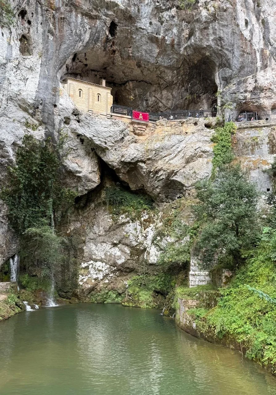 Holy Cave of Covadonga: A refuge of faith between rock and water.
