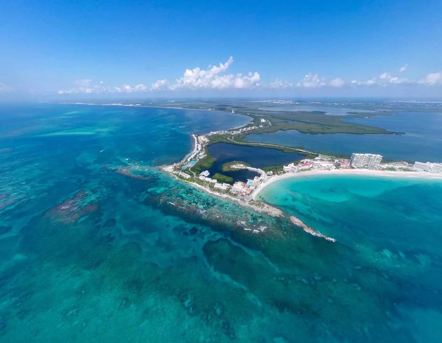 Paradise unfolds in endless shades of blue.