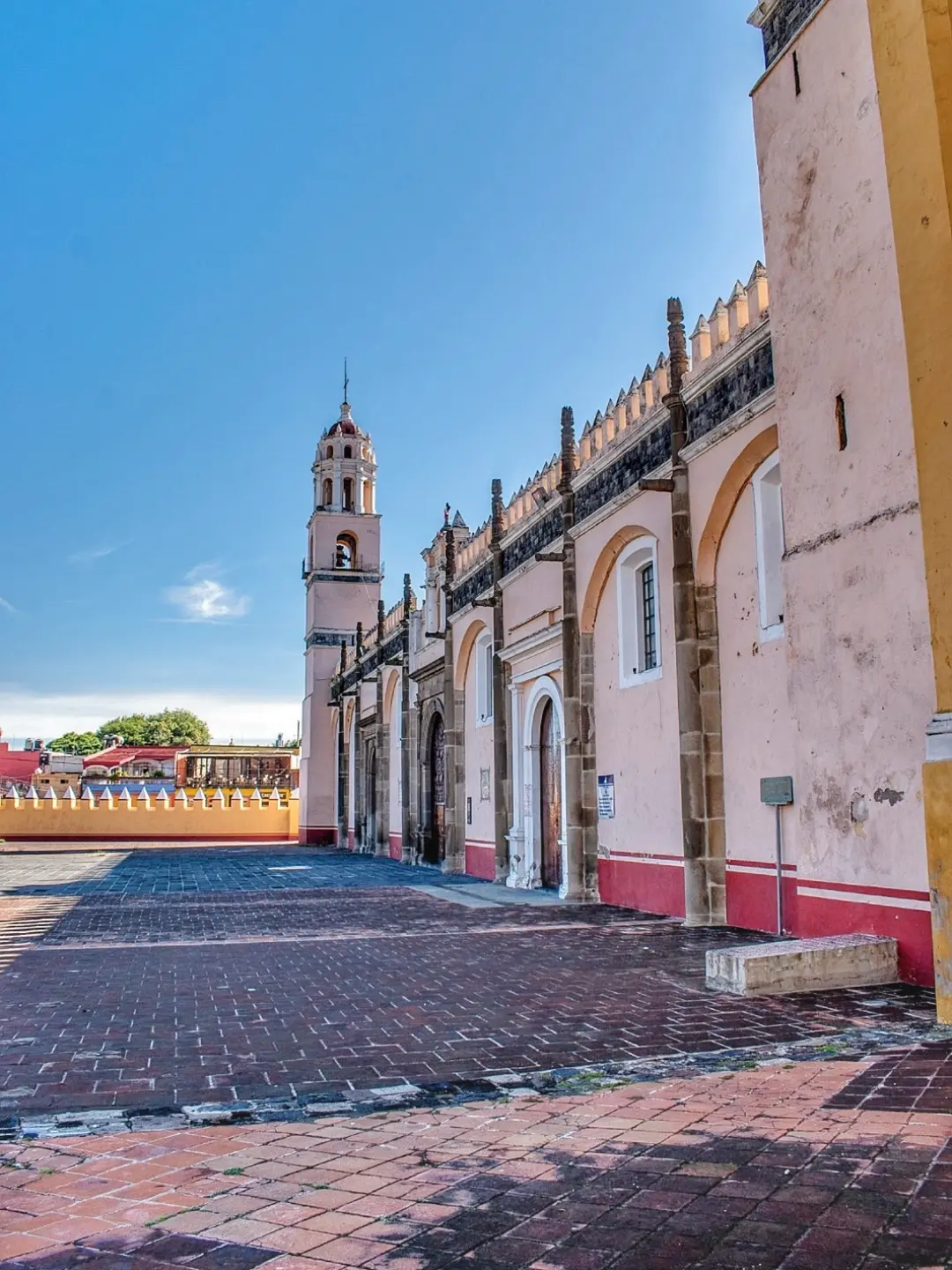 Centuries-old walls preserving the history and faith of Cholula.